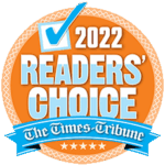 Orange circular badge with a blue checkmark, large text reading 2022 Readers Choice and a blue ribbon at the bottom displaying The Times-Tribune with five white stars underneath.