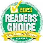 Green circular badge with a yellow check mark, text 2023 Readers Choice, and a yellow ribbon reading The Times-Tribune with five white stars below.